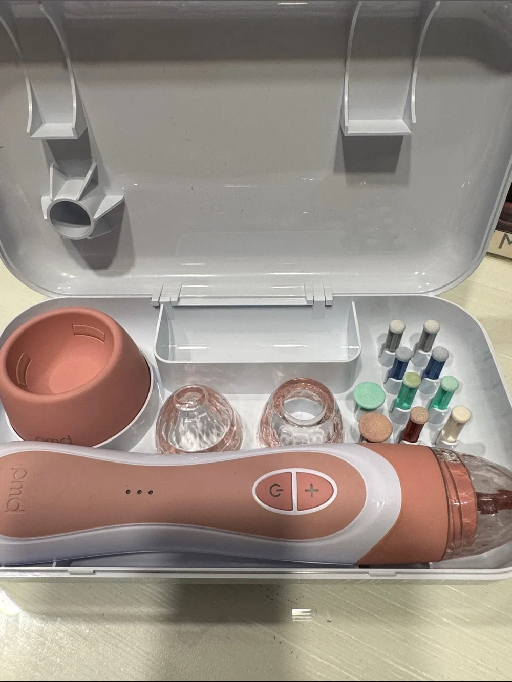 PMD personal At-Home Microdermabrasion Elite Pro Device in Rose Gold and White
